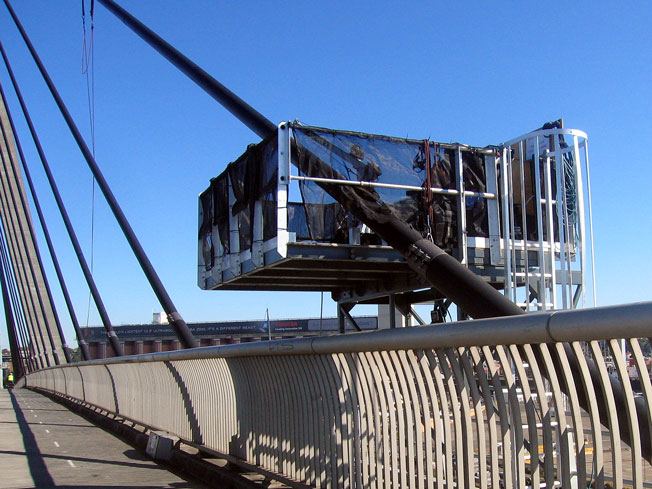 Work platform behind the original fence